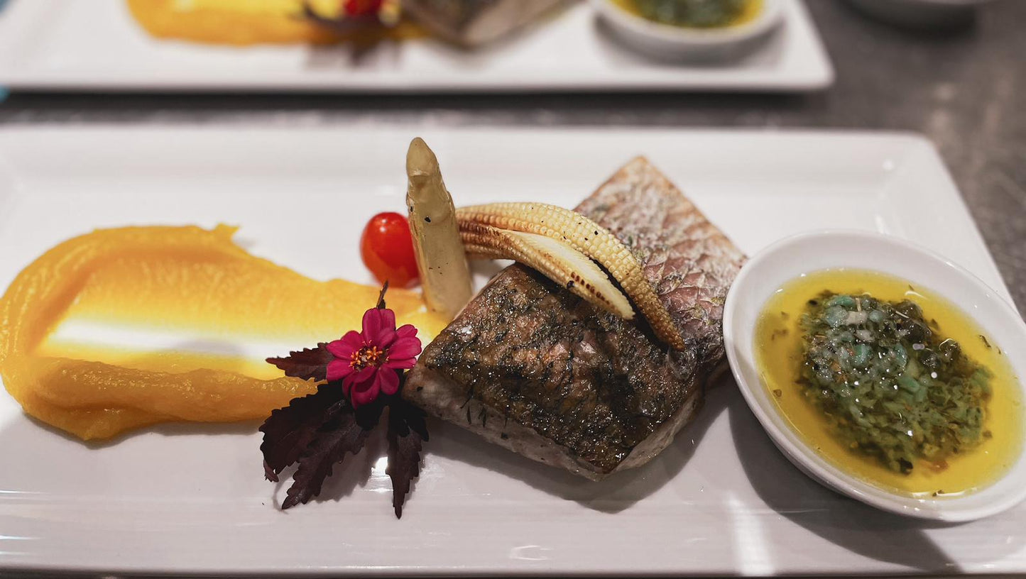 Grilled fish with puree. Fine dining with private chefs. Paradise Travel and Tours.