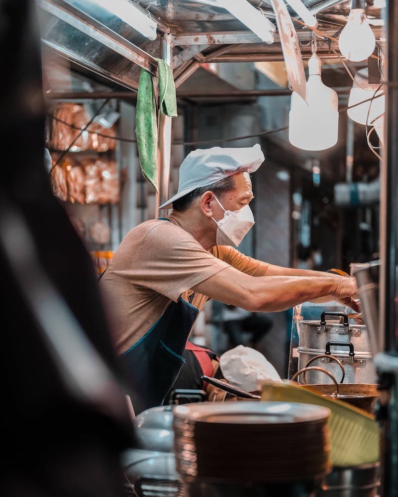 Man cooking in restaurant in Koh Samui, Thailand