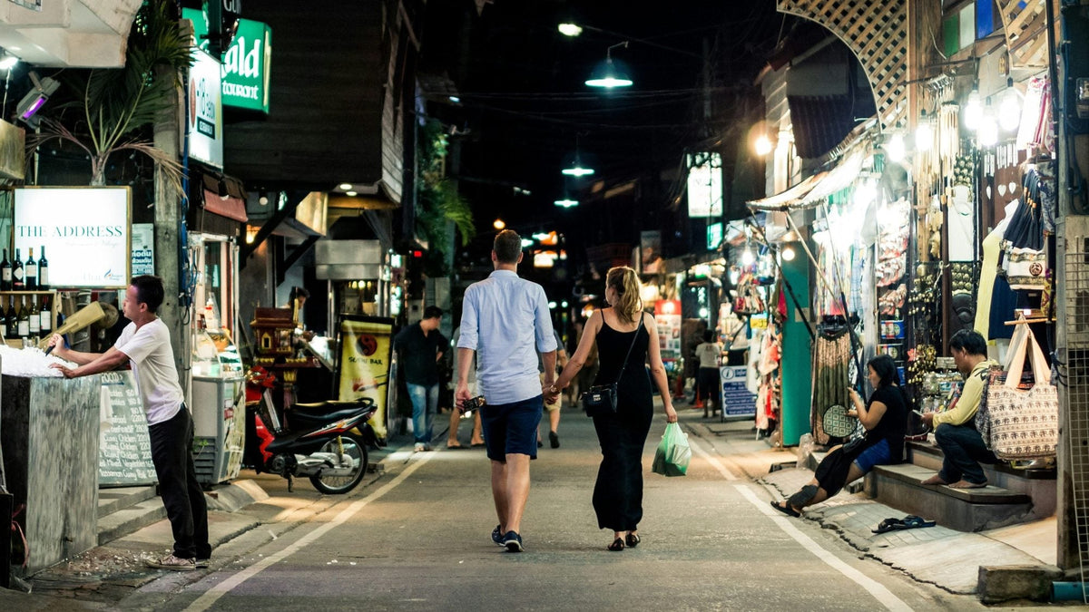 The lit-up main street of Fisherman's Village in Bophut, Koh Samui, at night