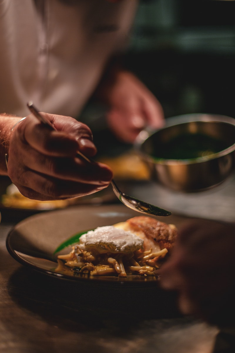 Chef preparing food for services for private guests 