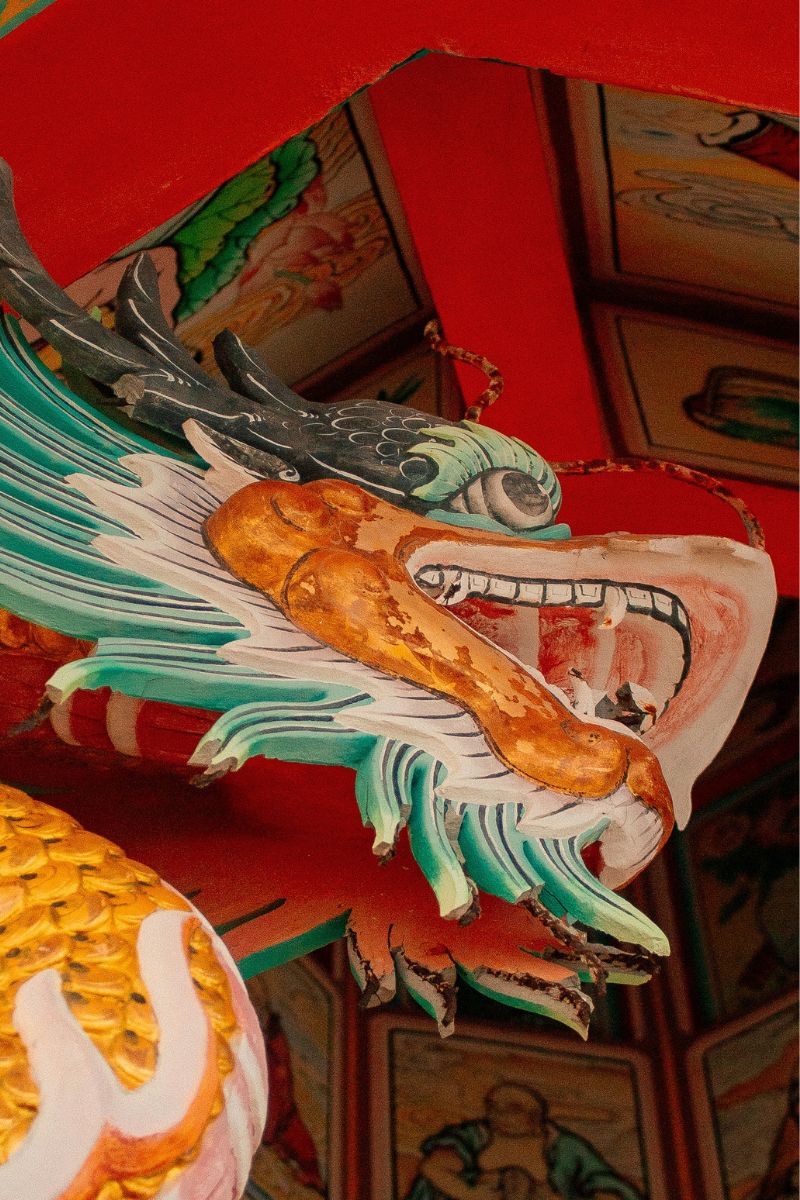 Colorful dragon design on a red background